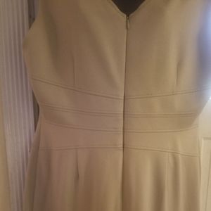 Tan sheath sleeveless dress. Midi,